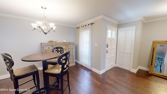 dining space with an inviting chandelier, crown molding, and dark hardwood / wood-style floors