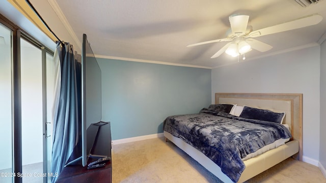 bedroom featuring ceiling fan, ornamental molding, and light colored carpet