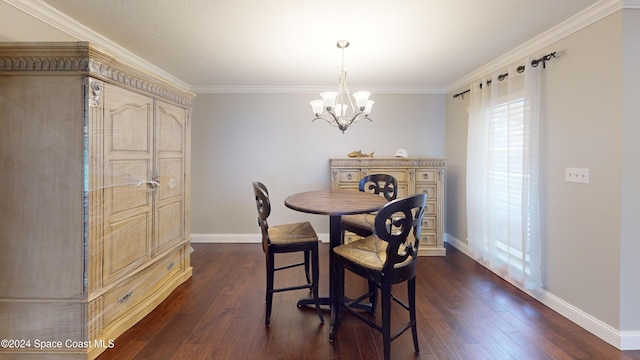 dining space featuring crown molding, dark hardwood / wood-style flooring, and an inviting chandelier