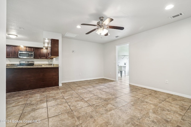unfurnished living room featuring a ceiling fan, baseboards, light tile patterned floors, and recessed lighting