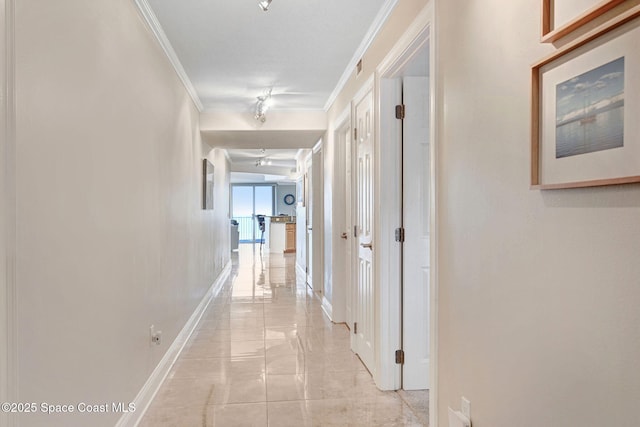 hallway featuring crown molding