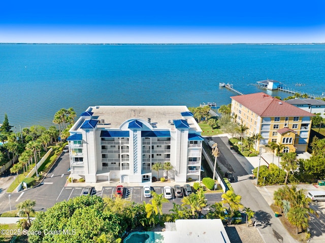 birds eye view of property featuring a water view