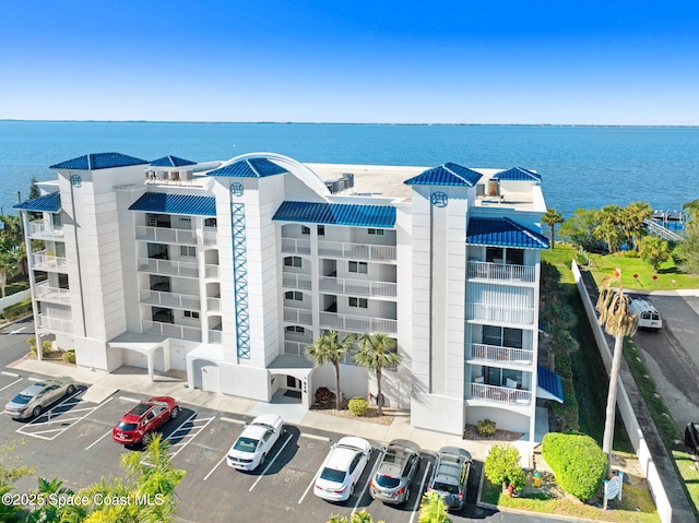 view of property with a water view