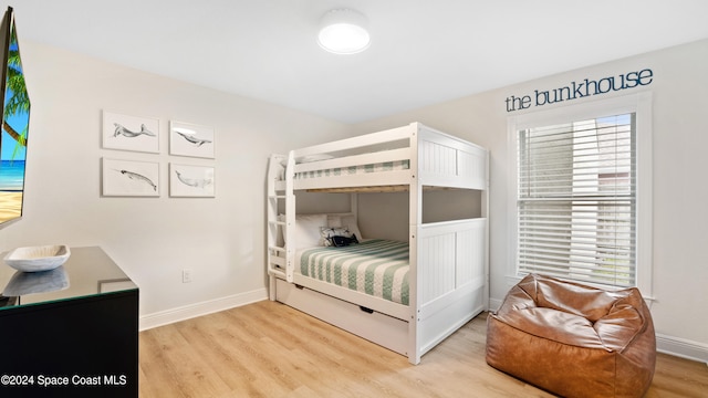 bedroom featuring light wood-type flooring