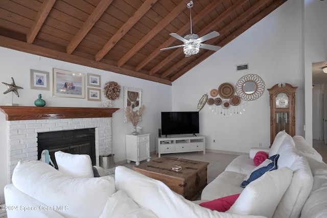 living room with high vaulted ceiling, beam ceiling, light tile patterned floors, a brick fireplace, and wooden ceiling