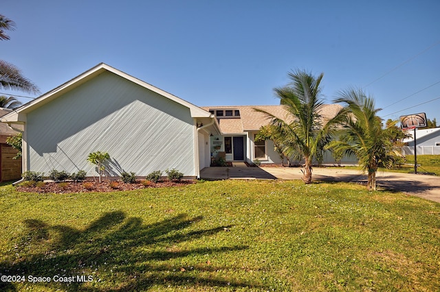 exterior space featuring a front lawn