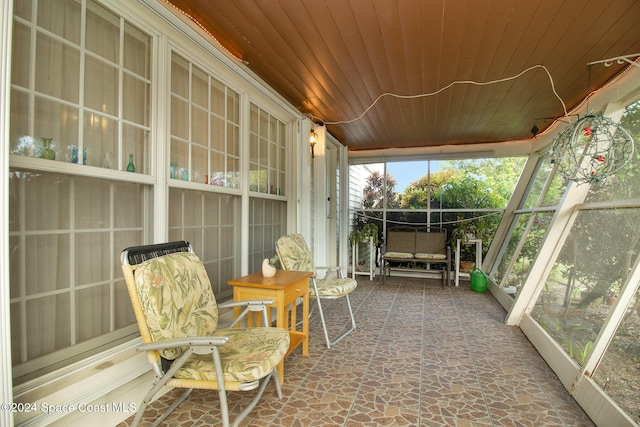 sunroom with wood ceiling