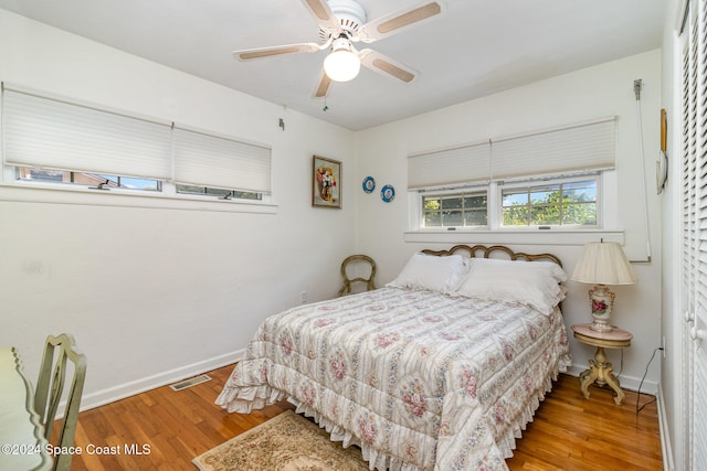 bedroom featuring ceiling fan and light wood-type flooring