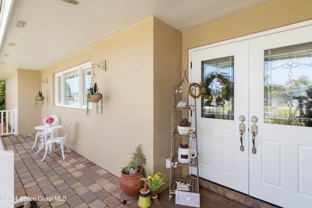 entrance to property with french doors