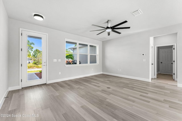 interior space featuring light wood-type flooring and ceiling fan