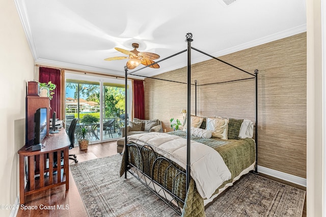 bedroom with access to outside, ornamental molding, wood-type flooring, and ceiling fan