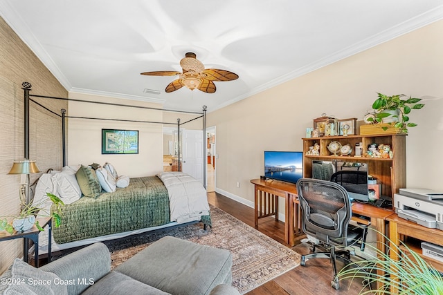 bedroom featuring ceiling fan, ornamental molding, and hardwood / wood-style floors