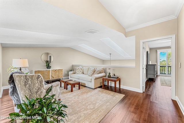 living room featuring ornamental molding, vaulted ceiling, and dark hardwood / wood-style floors