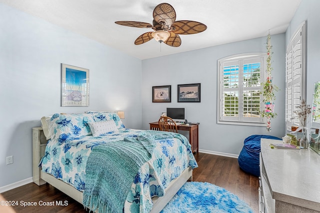 bedroom featuring ceiling fan and dark hardwood / wood-style floors