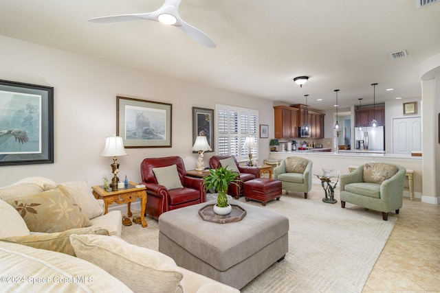 living room featuring light tile patterned floors, ceiling fan, recessed lighting, and visible vents
