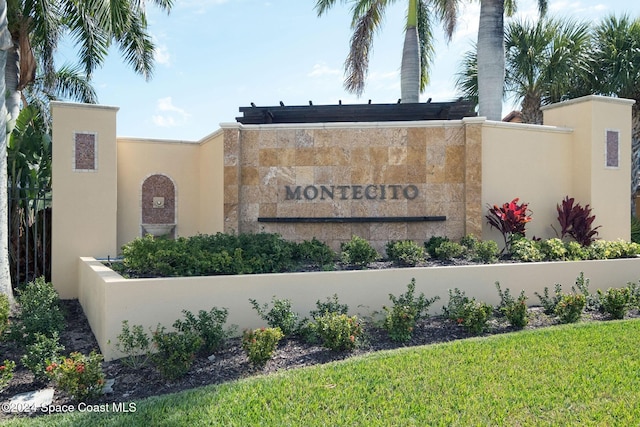 view of community sign