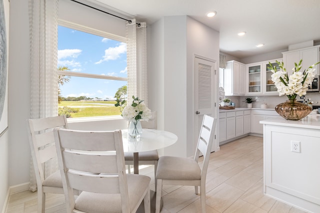 dining room featuring light tile patterned floors