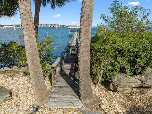 view of dock with a water view