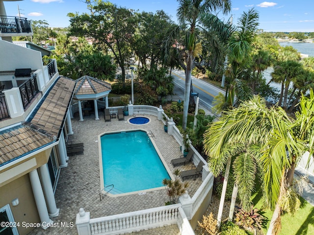 view of pool with a gazebo and a patio area