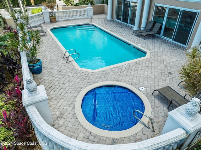 view of pool with a patio area