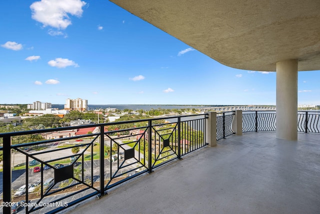 balcony featuring a water view