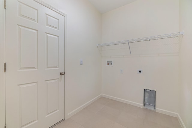 laundry room featuring hookup for a washing machine, light tile patterned floors, and hookup for an electric dryer