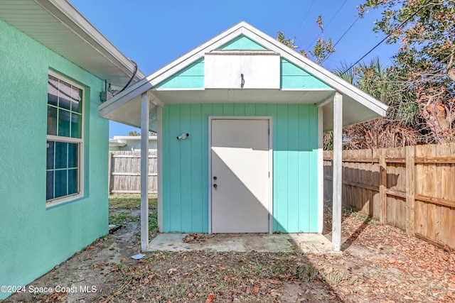 view of shed featuring a fenced backyard