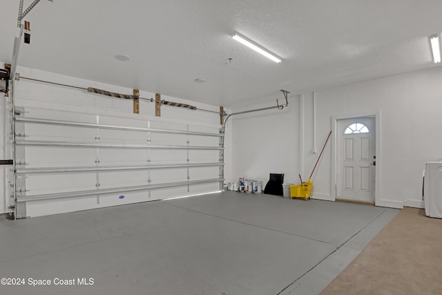 garage featuring washer / clothes dryer