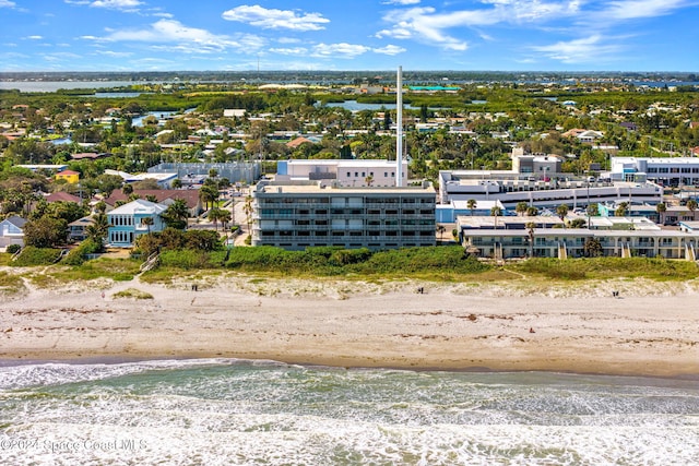 drone / aerial view of waterfront with a beach