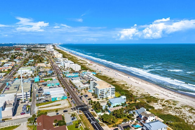 aerial view featuring a water view and a beach view