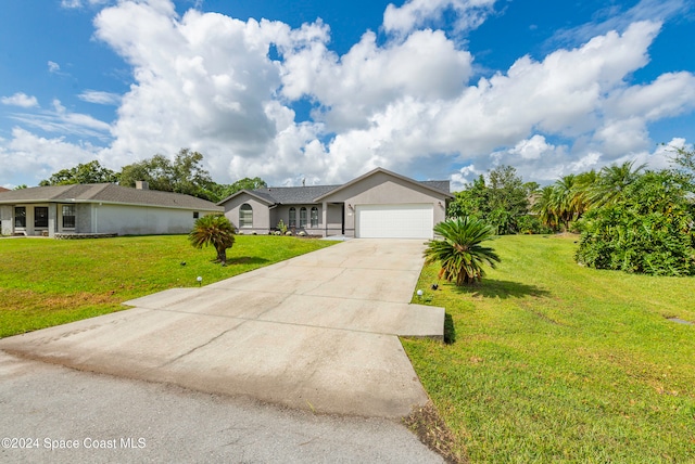 ranch-style house with a front lawn and a garage