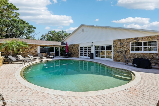 view of pool with a patio