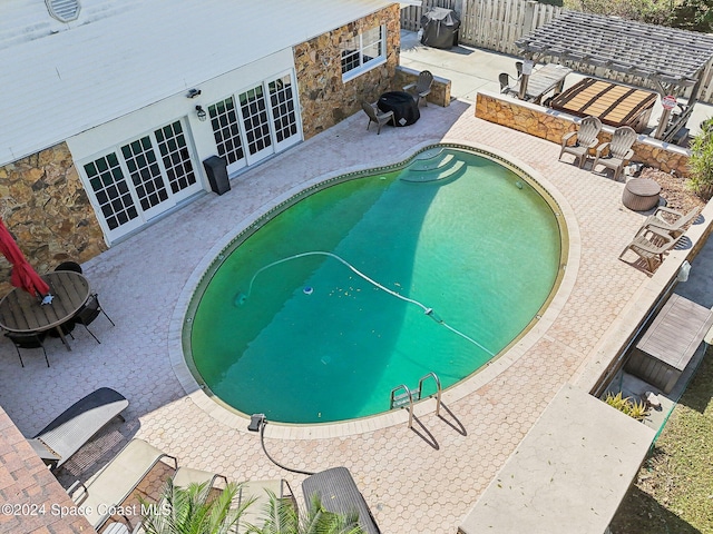 view of pool with a patio area