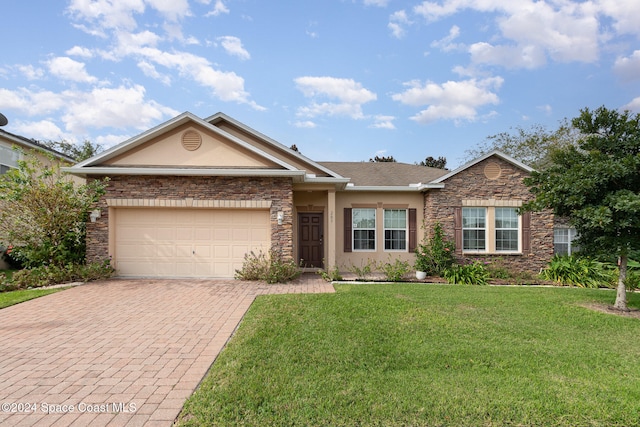 ranch-style house with a front lawn and a garage