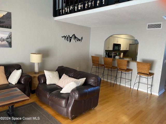 living room featuring wood-type flooring