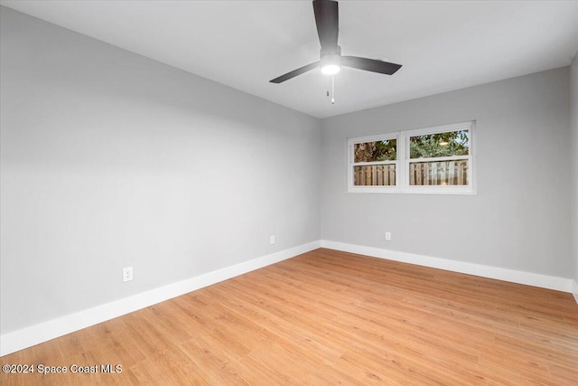 unfurnished room with light hardwood / wood-style floors and ceiling fan