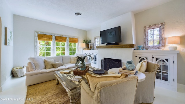 living room featuring a textured ceiling