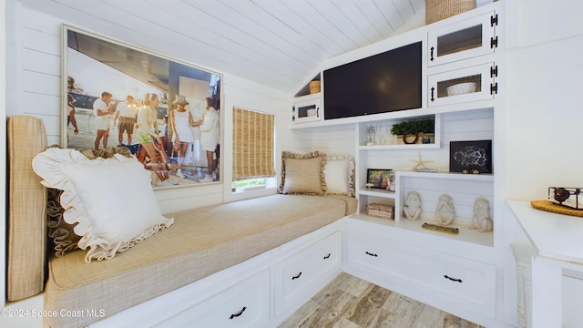 mudroom featuring wood ceiling, light wood-type flooring, and vaulted ceiling