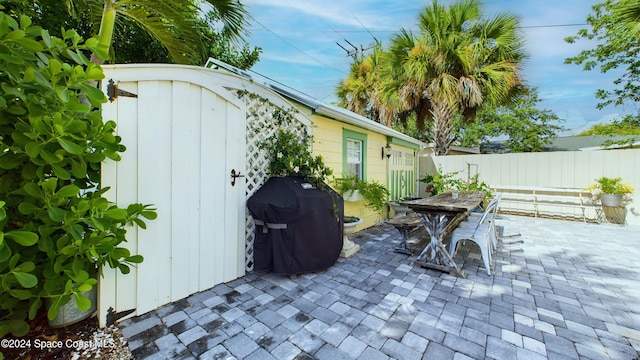 view of patio with a grill