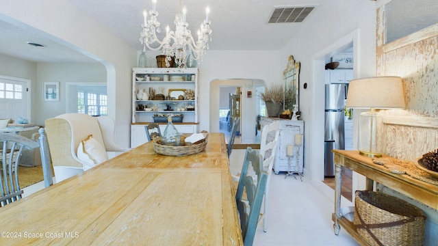 dining area with a chandelier