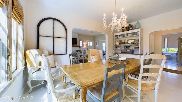 dining room featuring a chandelier