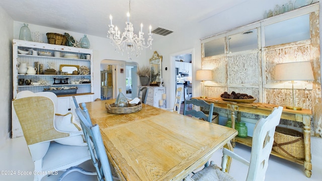 dining area with a chandelier