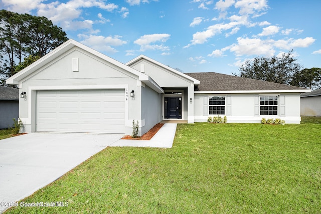 ranch-style house with a garage and a front lawn