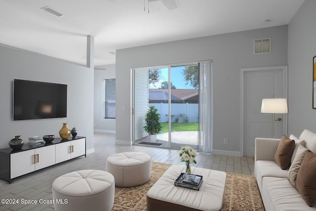 living room featuring ceiling fan