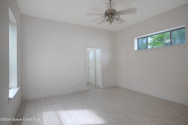 spare room with ceiling fan