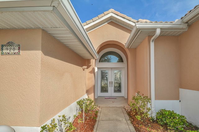 doorway to property featuring french doors