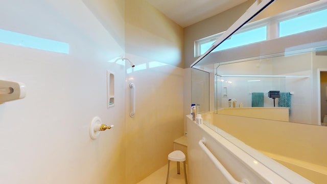 bathroom featuring walk in shower