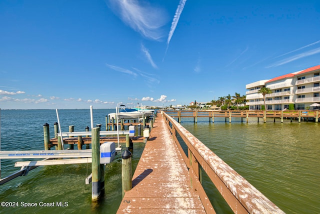 view of dock with a water view