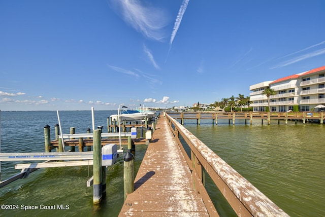 3360 S Atlantic Ave Unit 212, Cocoa Beach, FL 32931 - dock area with a water view and boat lift