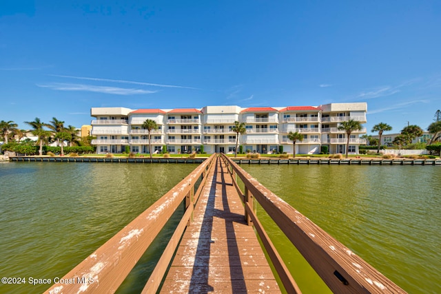 view of dock with a water view